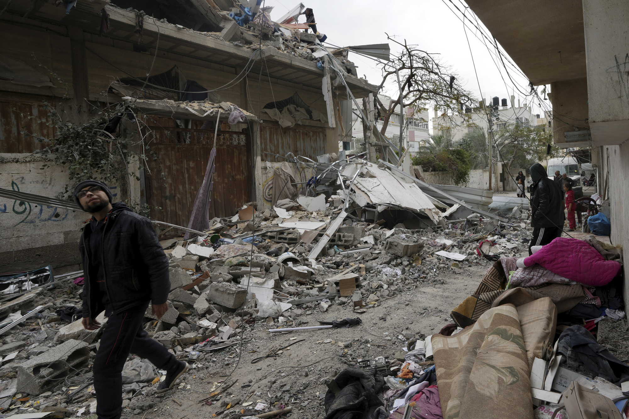 More than 90 Palestinians killed as Israeli strikes hit two homes