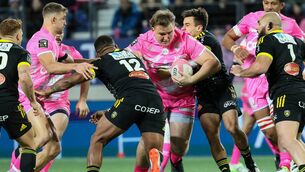 <p>Van der Stade Francais' South African lock JJ Van Der Mescht (C) attempts to break away during the French Top 14 rugby union match between Stade Francais and Stade Rochelais at the Jean-Bouin stadium, in Paris, on December 23, 2023. (Photo by ALAIN JOCARD / AFP) (Photo by ALAIN JOCARD/AFP via Getty Images)</p>