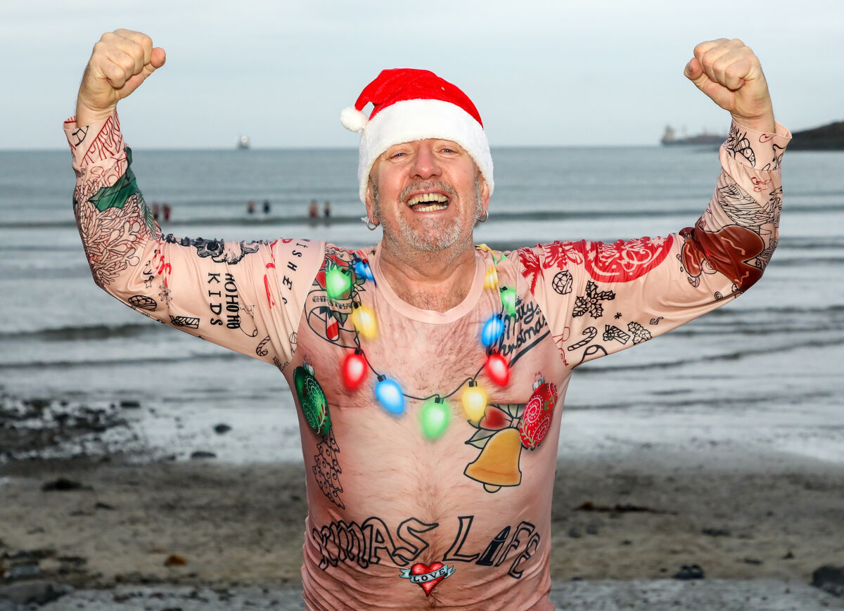 Edward O'Callaghan celebrates after finishing his Christmas morning swim at Fountainstown, Co. Cork.Picture: David Creedon