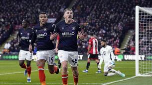 <p>COMEBACK: Alfie Doughty (right) celebrates scoring the opening goal (Danny Lawson/PA)</p>
