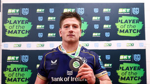 <p>Leinster's Joe McCarthy is presented with the BKT United Rugby Championship Player of the Match medal </p>