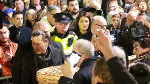<p>Johnny Depp carrying Shane MacGowan's coffin after his funeral mass in Nenagh earlier this month' Picture: Brendan Gleeson</p>