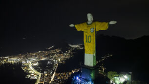 The Christ the Redeemer statue was illuminated with an image of Pele’s Brazil jersey as a tribute to the football star (AP Photo/Bruna Prado)