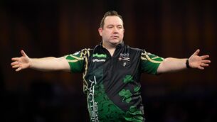 <p>FERMANAGH'S FINEST: Brendan Dolan in action against Gary Anderson (not pictured) on day thirteen of the Paddy Power World Darts Championship at Alexandra Palace, London. Pic: Zac Goodwin/PA Wire</p>