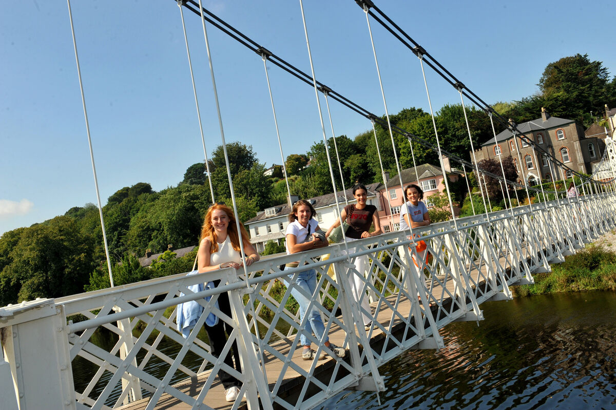 Tourists take in the view from Daly's Bridge, aka the Shakey Bridge Picture: Larry Cummins Tourists take in the view from Daly's Bridge, aka the Shakey Bridge Picture: Larry Cummins