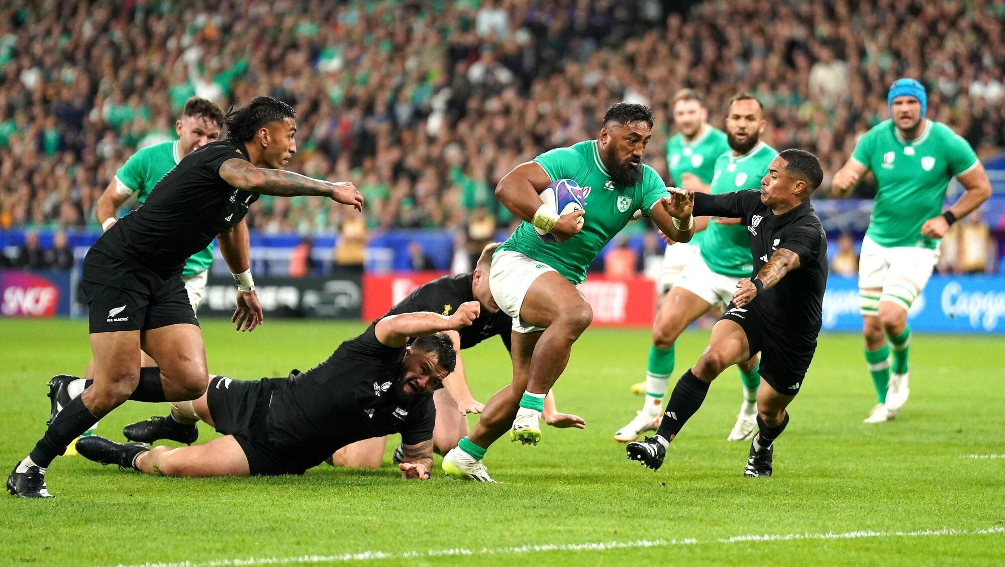 CLASSIC CLASH: Ireland's Bundee Aki scores his side's first try during the Rugby World Cup 2023 quarter final against New Zealand. Photo credit: Adam Davy/PA Wire.