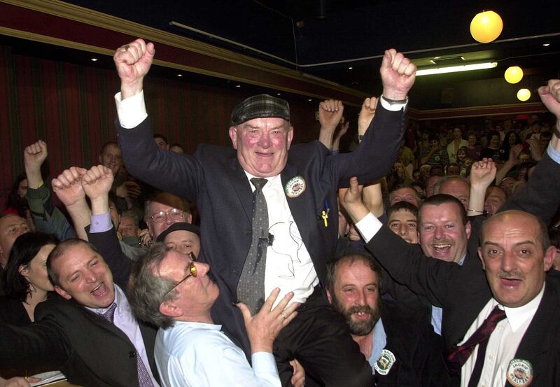 Deputy Jackie Healy-Rae is hoisted high by supporters after a full recount in the 2002 general election. Picture: Don MacMonagle