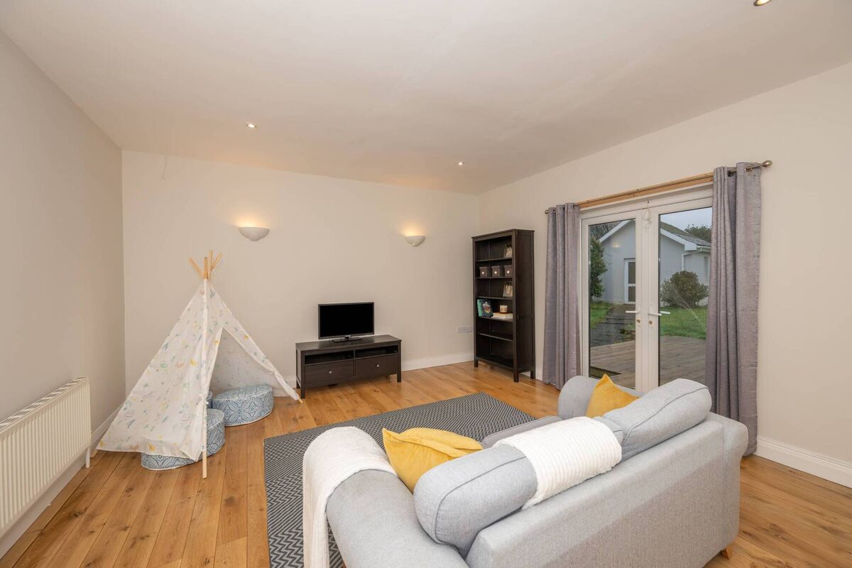 Family room with sliding doors to the patio