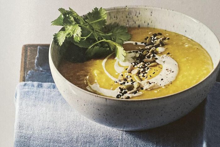Red Lentil Soup with Turmeric, Masala Yoghurt, Toasted Seeds and Coriander