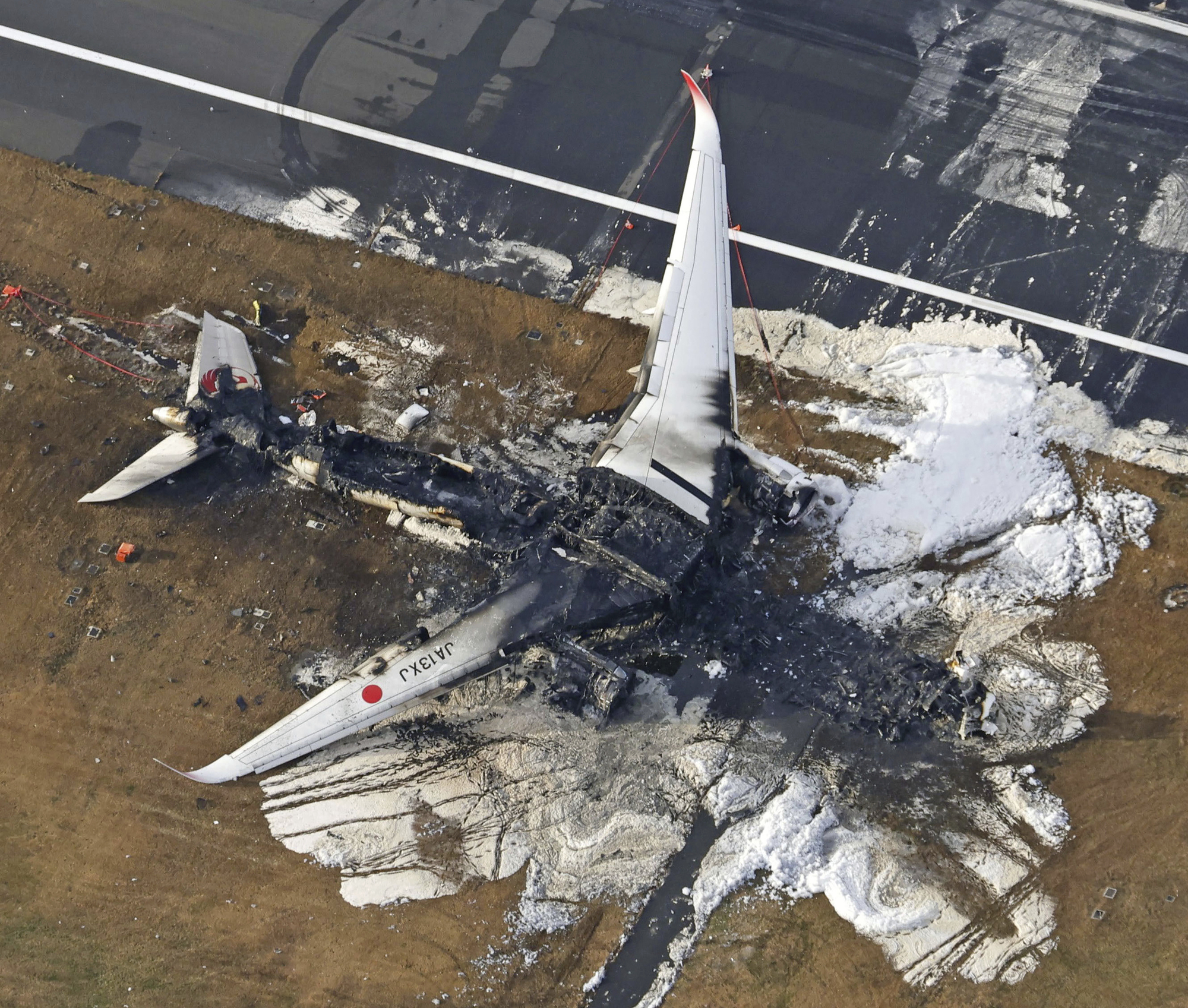 Officials search for voice recorder in debris of Japan runway