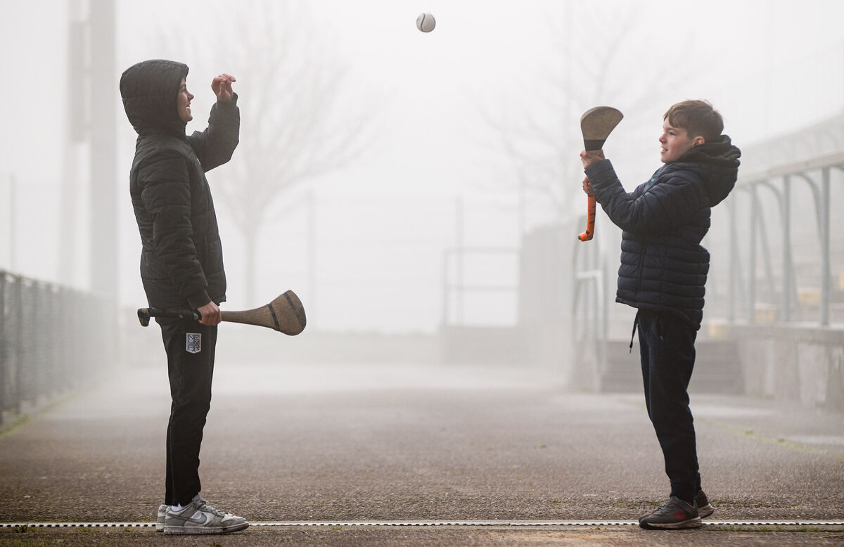 Brothers James (12) and Oisin Ryan (10) of Valley Rovers have a puck-about ahead of the game