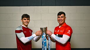 <p>DIFFERENT CLASS: University of Galway footballer Tommy Conroy, left, and University College Cork footballer Dylan Foley with the Sigerson Cup before the draw for the Electric Ireland GAA Higher Education Championships at Croke Park in Dublin last month. PictureL Piaras Ó Mídheach/Sportsfile</p>