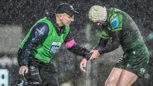 <p>RULED OUT OF SIX NATIONS: Mack Hansen of Connacht leaves the pitch to receive medical attention for an injury during the United Rugby Championship match between Connacht and Munster at The Sportsground in Galway. Pic: Piaras Ó Mídheach/Sportsfile</p>