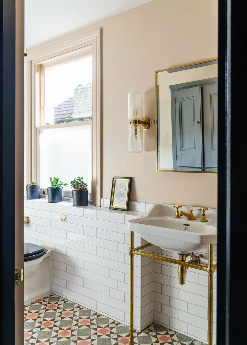  Farrow &amp; Ball's Setting Plaster adds a touch of warmth in a typically chilly bathroom.
