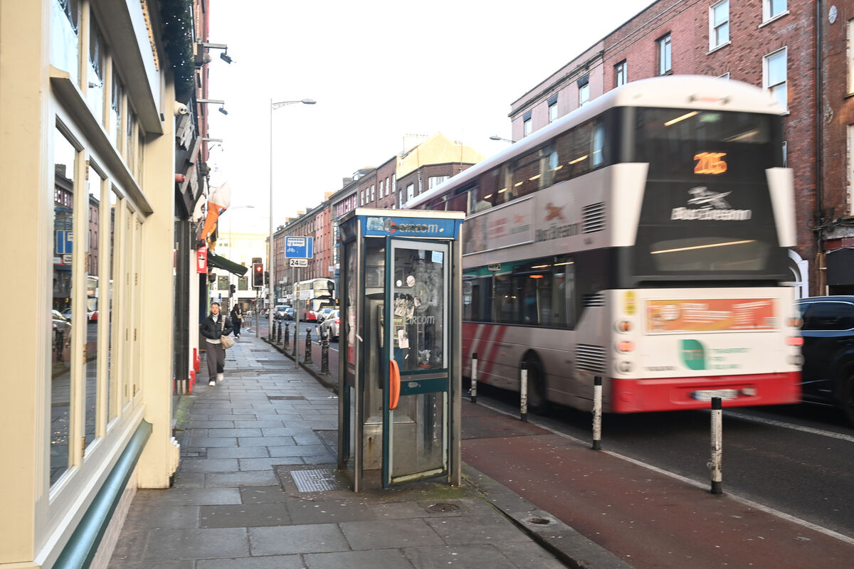  A pair of disused and vandalised Eircom telephone boxes on Washington Street, Cork. Picture: Larry Cummins