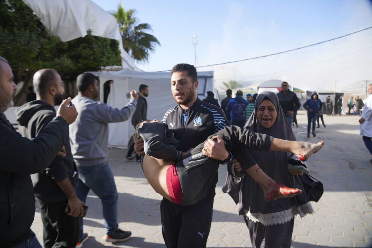 Wounded Palestinians run into Al-Aqsa Hospital In Deir al Balah, Gaza Strip, moments after an Israeli strike hit a building next to it on Wednesday, Jan. 10, 2024. Picture: AP Photo/Hatem Moussa Wounded Palestinians run into Al-Aqsa Hospital In Deir al Balah, Gaza Strip, moments after an Israeli strike hit a building next to it on Wednesday, Jan. 10, 2024. Picture: AP Photo/Hatem Moussa