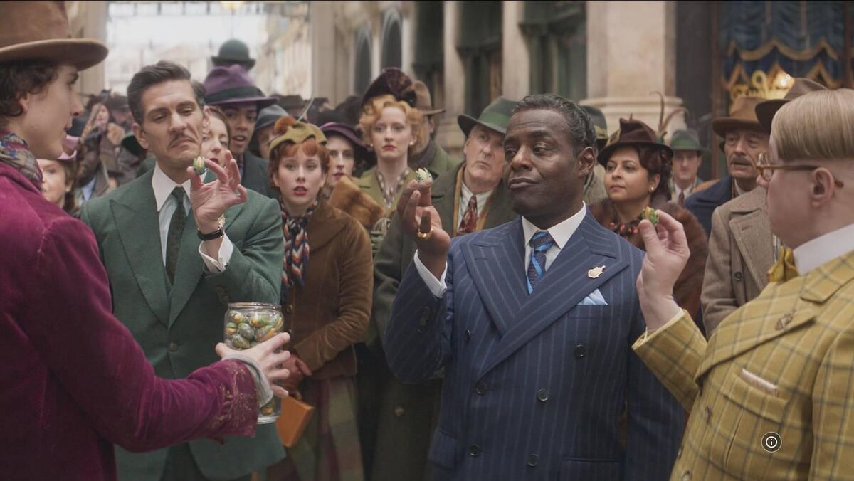 Paterson Joseph, Matt Lucas, Mathew Baynton, and Timothée Chalamet in a scene from 'Wonka'. Paterson Joseph, Matt Lucas, Mathew Baynton, and Timothée Chalamet in a scene from 'Wonka'.