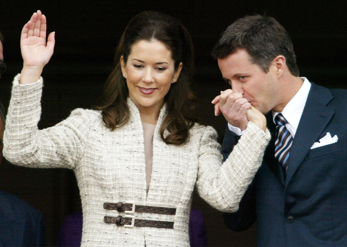 Denmark's Crown Prince Frederik kisses the hand of his fiancee Mary Donaldson of Australia as they appear on the balcony of the Christian IX palace in October, 2003. Picture: Photo/Heribert Proepper Denmark's Crown Prince Frederik kisses the hand of his fiancee Mary Donaldson of Australia as they appear on the balcony of the Christian IX palace in October, 2003. Picture: Photo/Heribert Proepper