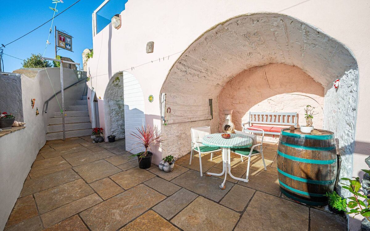 Patio No 2 has a Mediterranean vibe Patio No 2 has a Mediterranean vibe