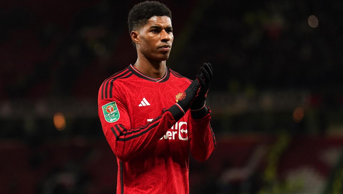 Manchester United's Marcus Rashford applauds the fans.