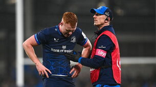 <p>SOUR NOTE: Ciarán Frawley of Leinster receives treatment with Leinster senior physiotherapist Darragh Curley. Pic: Harry Murphy, Sportsfile</p>
