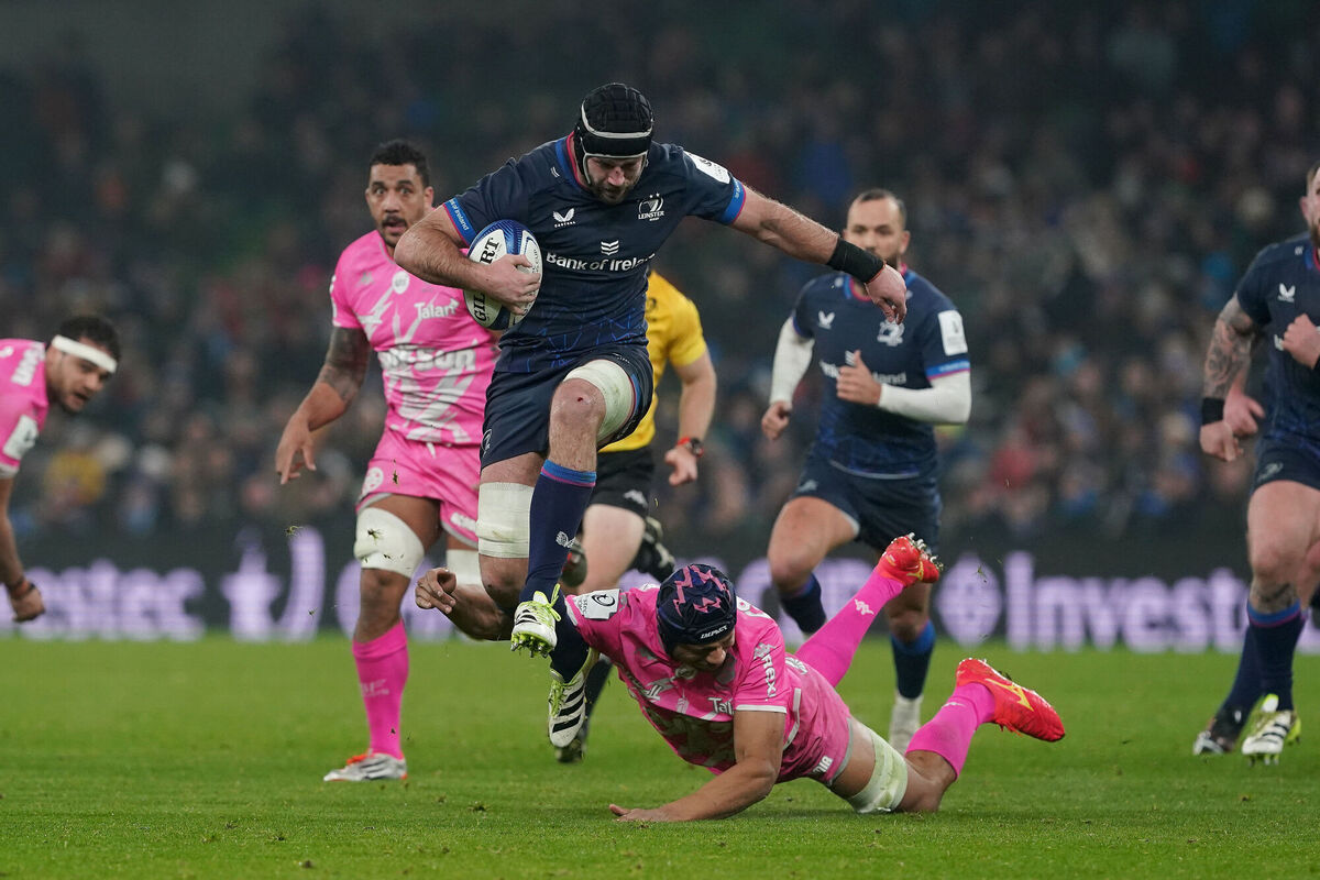 Leinster's Caelan Doris is tackled by Stade Francais' Pierre-Henri Azagoh. Photo credit: Brian Lawless/PA Wire. Leinster's Caelan Doris is tackled by Stade Francais' Pierre-Henri Azagoh. Photo credit: Brian Lawless/PA Wire.