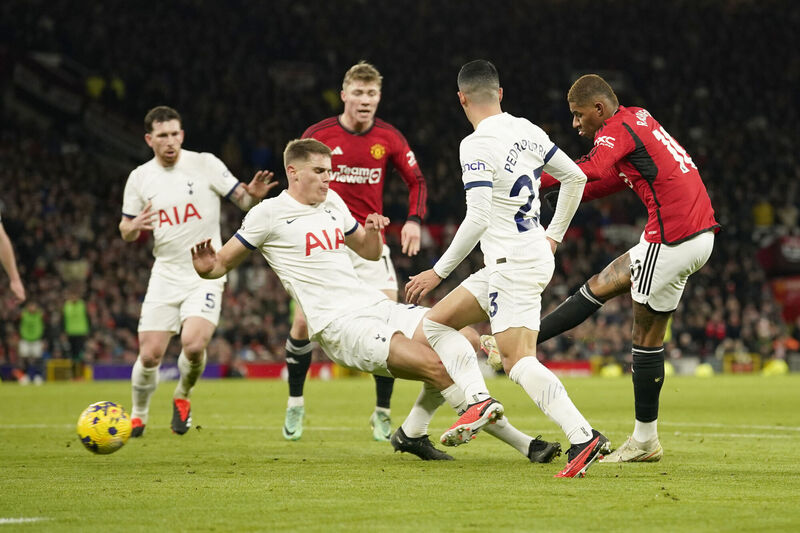 Manchester United's Marcus Rashford scores his side's second goal. (AP Photo/Dave Thompson)
