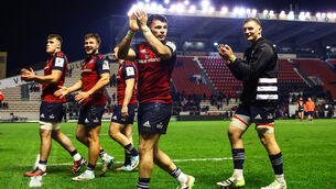<p>RED SUCCESS: Munster's Calvin Nash and Gavin Coombes applaud the fans after the game. Pic: Fred Porcu, Inpho</p>
