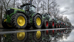Farmers park their tractors at the government district in Berlin (AP)