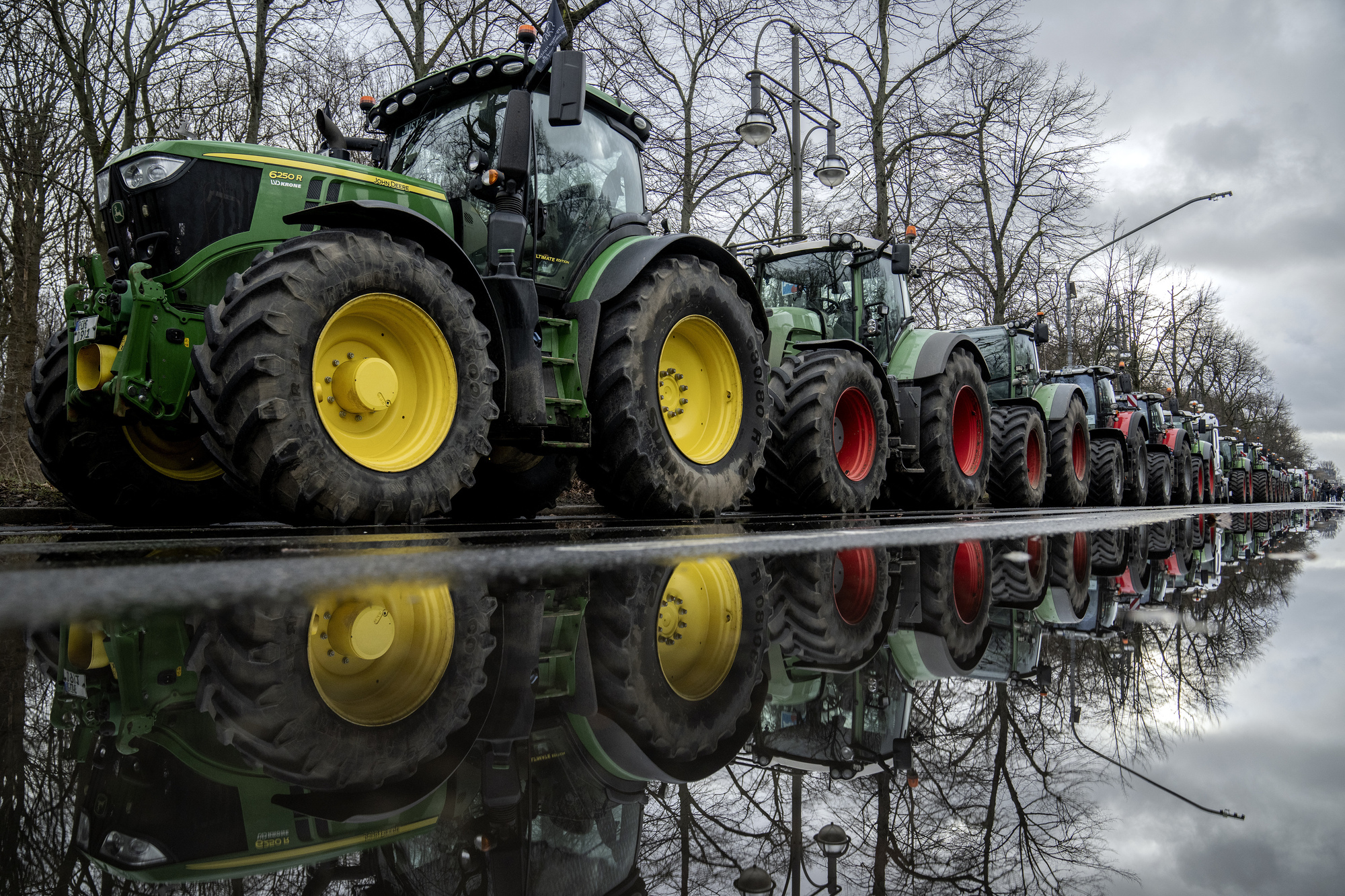 Farmers drive thousands of tractors into Berlin in fuel subsidy cuts protest