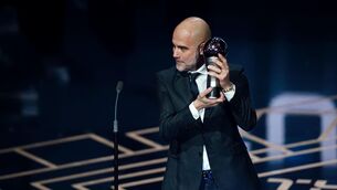<p>Pep Guardiola with the award for The Best FIFA Men's Coach.</p>