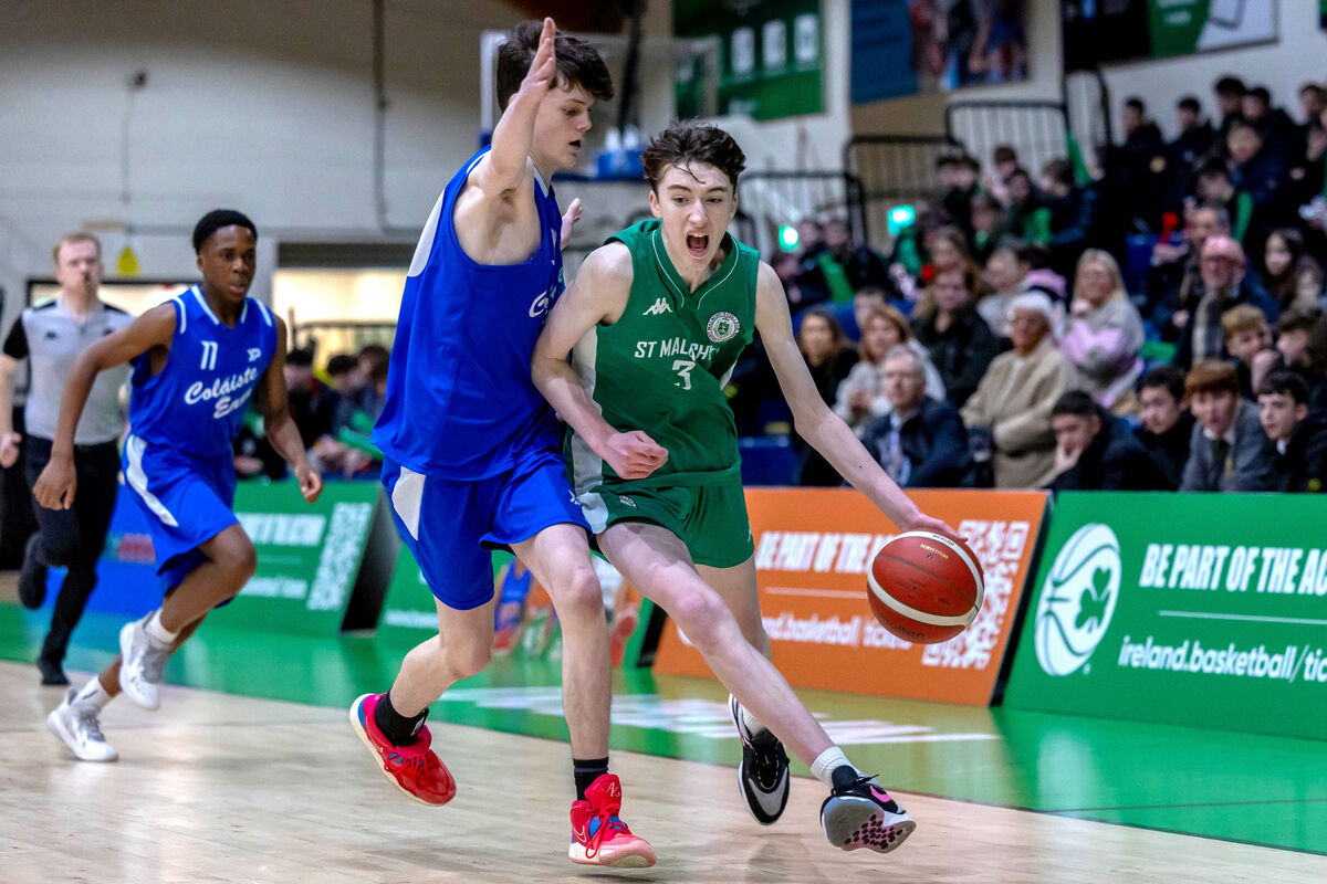St. Malachy’s Mark Burns with Harry Lynch of Colaiste Eanna.