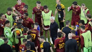 <p>ROMAN HOLIDAY: Roma's head coach Jose Mourinho talks to his players. Picture: AP Photo/Darko Vojinovic</p>