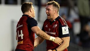 <p>Munster's Calvin Nash celebrates scoring a try with Peter O'Mahony.</p>