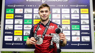 <p>Munster’s Jack Crowley with the Investec Player of the Match Award. Pic Credit: Laszlo Geczo, Inpho.</p>