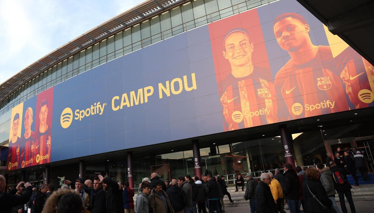 Fans arrive for the UEFA Europa League play-off first leg match at Spotify Camp Nou, Barcelona.