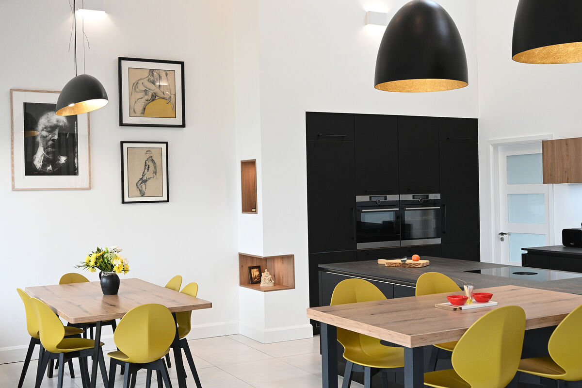For an open or broken-plan room, an occasional kids' dining area is ideal for busy socialites, kubeinteriors.com (Ireland).