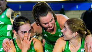 <p>Ireland’s Hannah McLoughlin, Deirdre Duke and Kathryn Mullan celebrate after the game.</p>