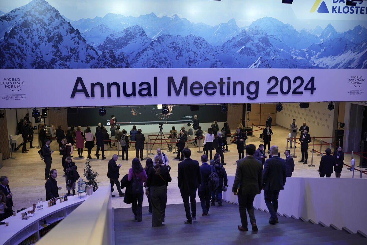 Participants walk through congress centre of the Annual Meeting of World Economic Forum in Davos, Switzerland. Picture: Markus Schreiber/AP Photo