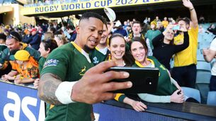 <p>Elton Jantjies of the Springboks signs autographs and takes a selfie with the fans at Adelaide Oval last month.</p>