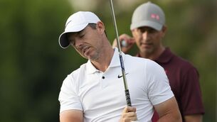 <p>Defending champion Rory McIlroy suffered a poor finish to his opening round in the Hero Dubai Desert Classic (Kamran Jebreili/AP)</p>