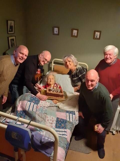 Kitty with her daughter Anne, and her sons Norman, Ivor, and George. 