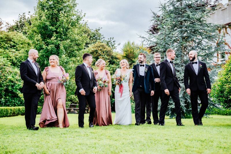 Tessa Hegarty and Adam Doyle with their wedding party. Tessa Hegarty and Adam Doyle with their wedding party.