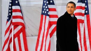 <p>Barack Obama climbs upstairs to deliver his speech during the 'We Are One' concert, one of the events of Obama's inauguration celebrations, at the Lincoln Memorial in Washington on January 18, 2009. Picture: Jewel Samad/AFP/Getty Images</p>