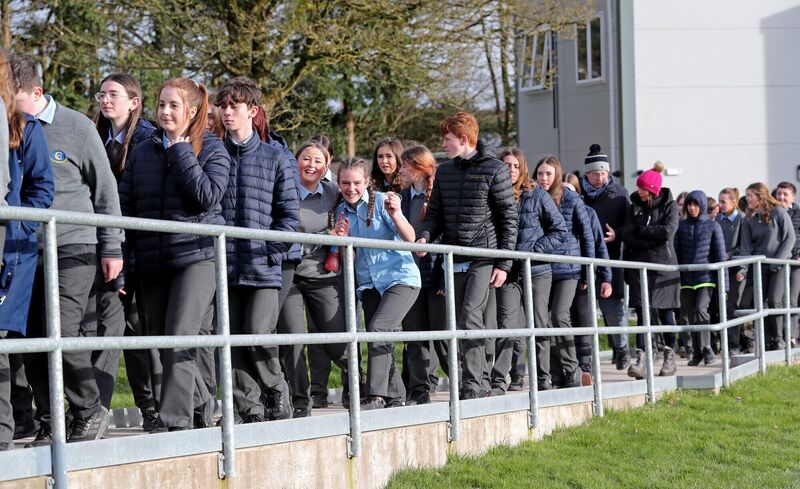 Coachford College students and staff on the school walkway. Coachford College students and staff on the school walkway.
