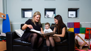 Preparing for Life home visitor Aoife O’Hara with toddler Lainie Deegan and mother Amy Deegan at Preparing for Life at the Bell Building, Darndale (Fintan Clarke)