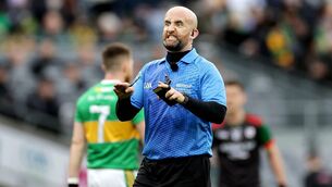 <p>TESTING: Referee Brendan Cawley during Sunday's thrilling All-Ireland Club SFC final between the Glen and St. Brigid's.</p>