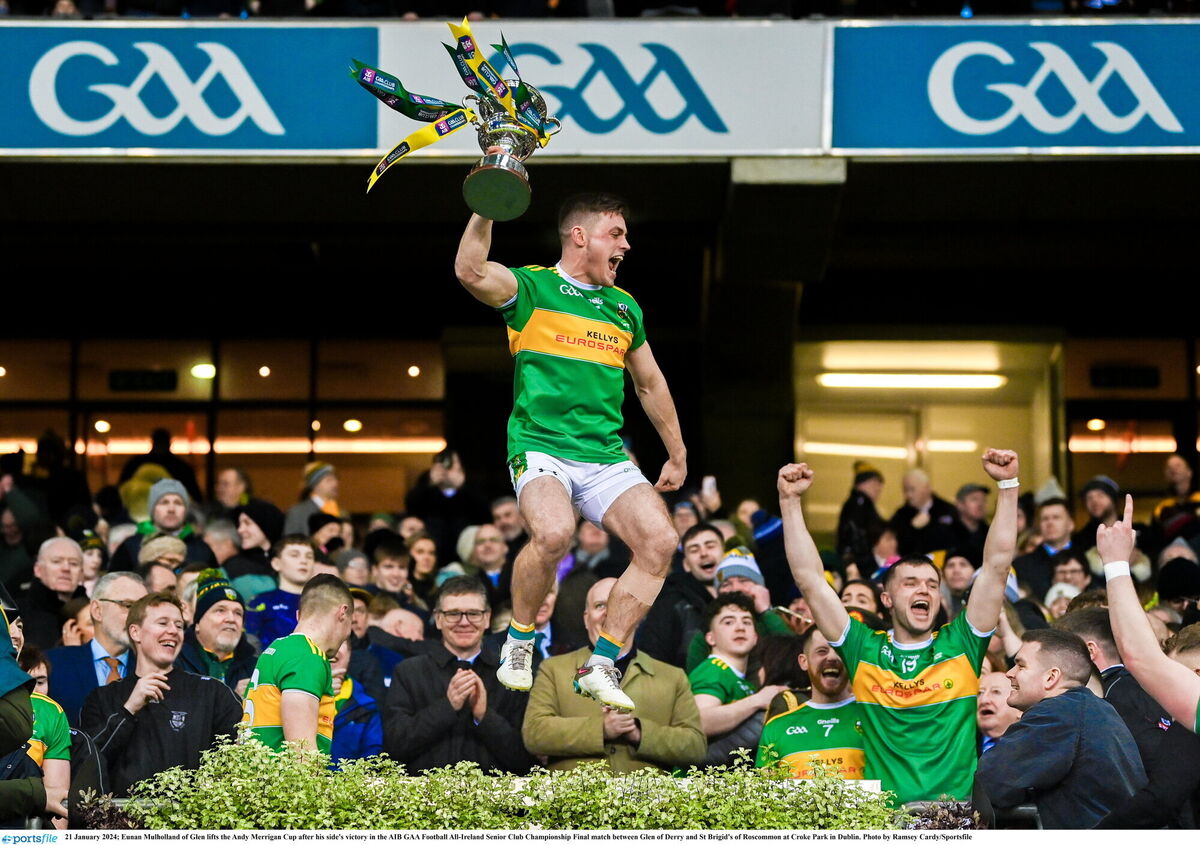 Eunan Mulholland of Glen lifts the Andy Merrigan Cup after his side's victory in the AIB GAA Football All-Ireland Senior Club Championship Final match between Glen of Derry and St Brigid's of Roscommon at Croke Park in Dublin. Photo by Ramsey Cardy/Sportsfile