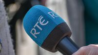 2J1K428 RTE logo on microphone. copyspace