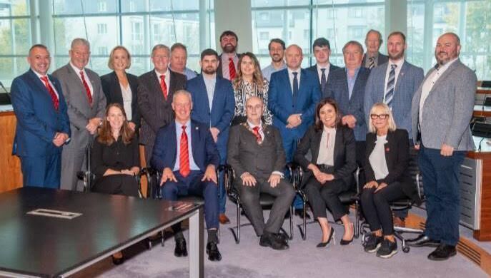 IIC Council members and friends attending an event to mark the IIC’s 100th anniversary in October 2023. 